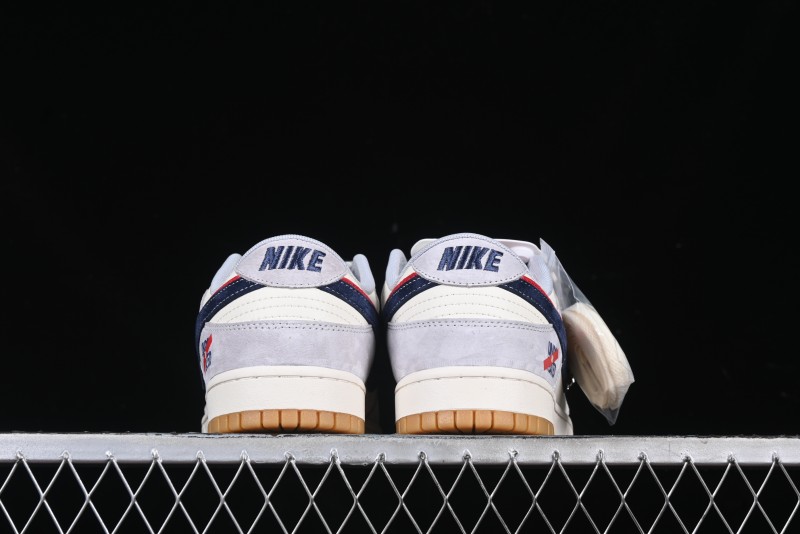 Nike SB Dunk Low UN Collaboration Anniversary Edition Custom Lifestyle Sneakers with Black Swoosh and Gum Sole - DM6868-032