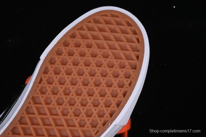 Vans Old Skool Distressed Black Canvas Sneakers with Orange Accents