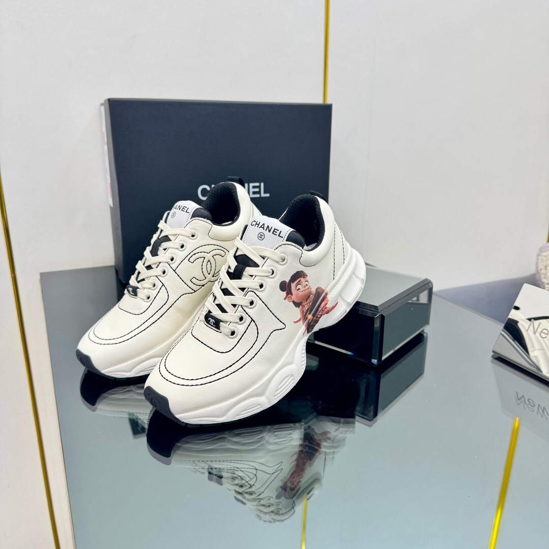 2025 Women Chanel White Leather Sneakers Cartoon Graphic