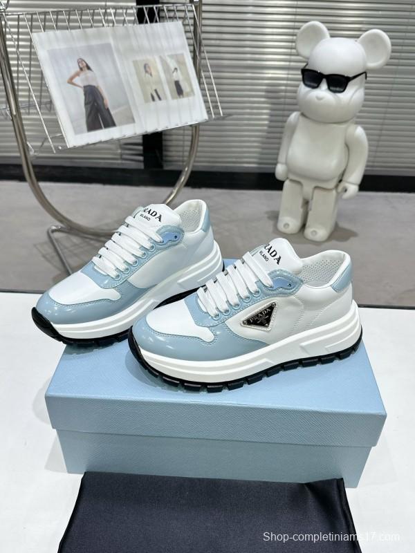 2025 Women Prada Light Blue White Leather Sneakers KFY00310