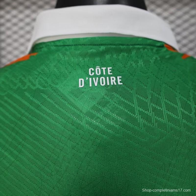 Player Version 2025 Ivory Coast Green with Elephant Graphic and Orange Trim Jersey